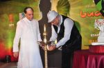 B.K Modi lighting the dia along with Subhash Chandra at Zee launches Buddha serial in J W Marriott in Mumbai on 2nd Sept 2013.JPG